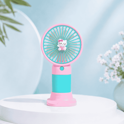 Pink and blue handheld fan with a cartoon character on a light blue background