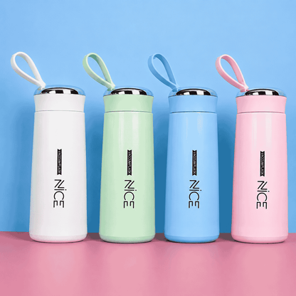 Four colorful water bottles with 'NICE' branding on a pink and blue background